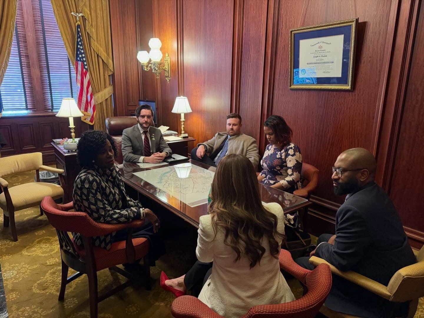 Joe Picozzi meeting with a group of residents in his Capitol office
