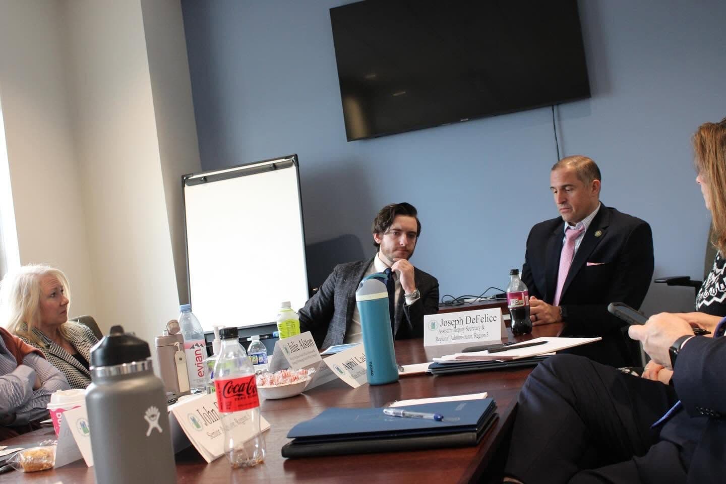 Joe Picozzi at a conference table during a roundtable meeting